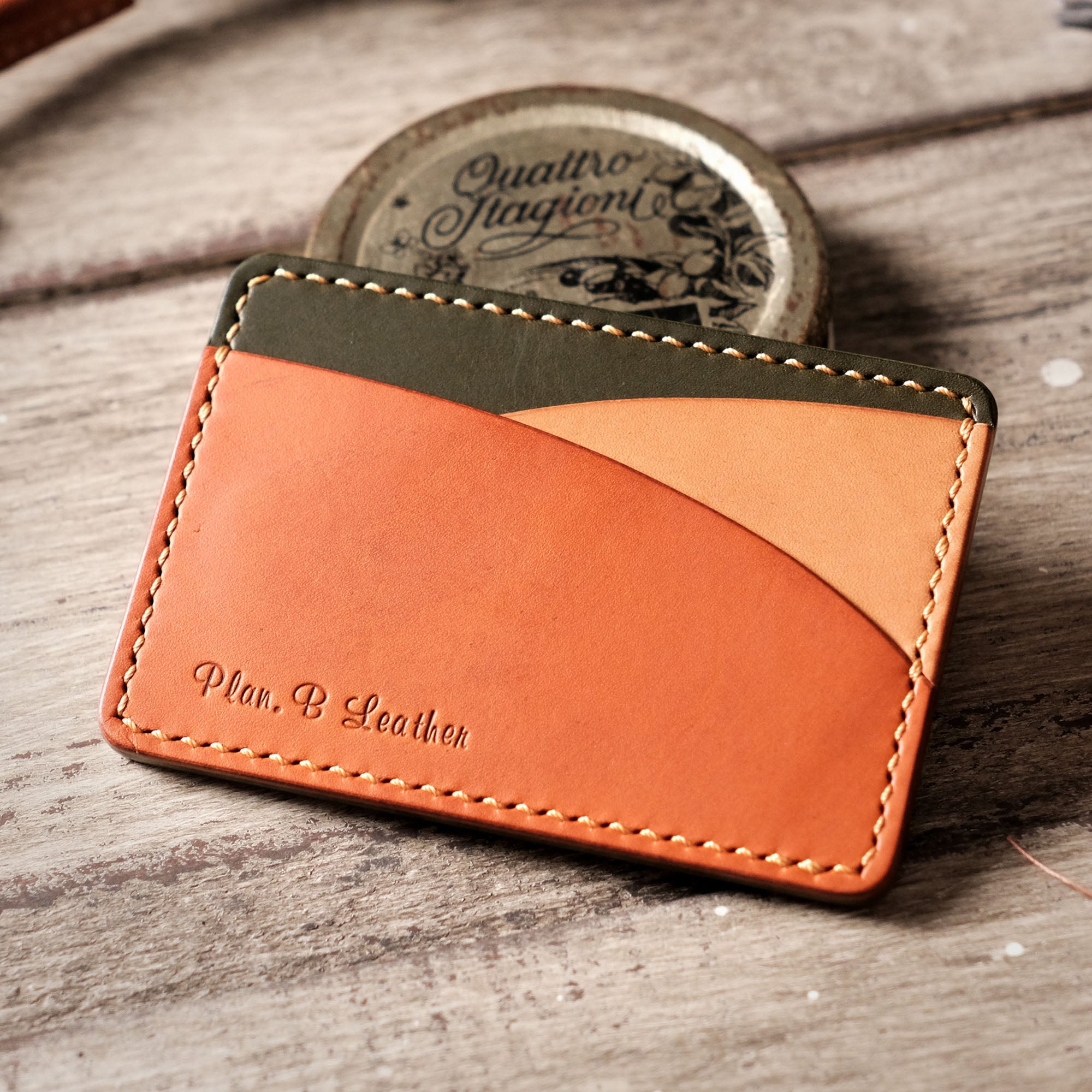 Side-angled view of the Hills Card Holder, featuring its distinctive hill-inspired pocket structure."