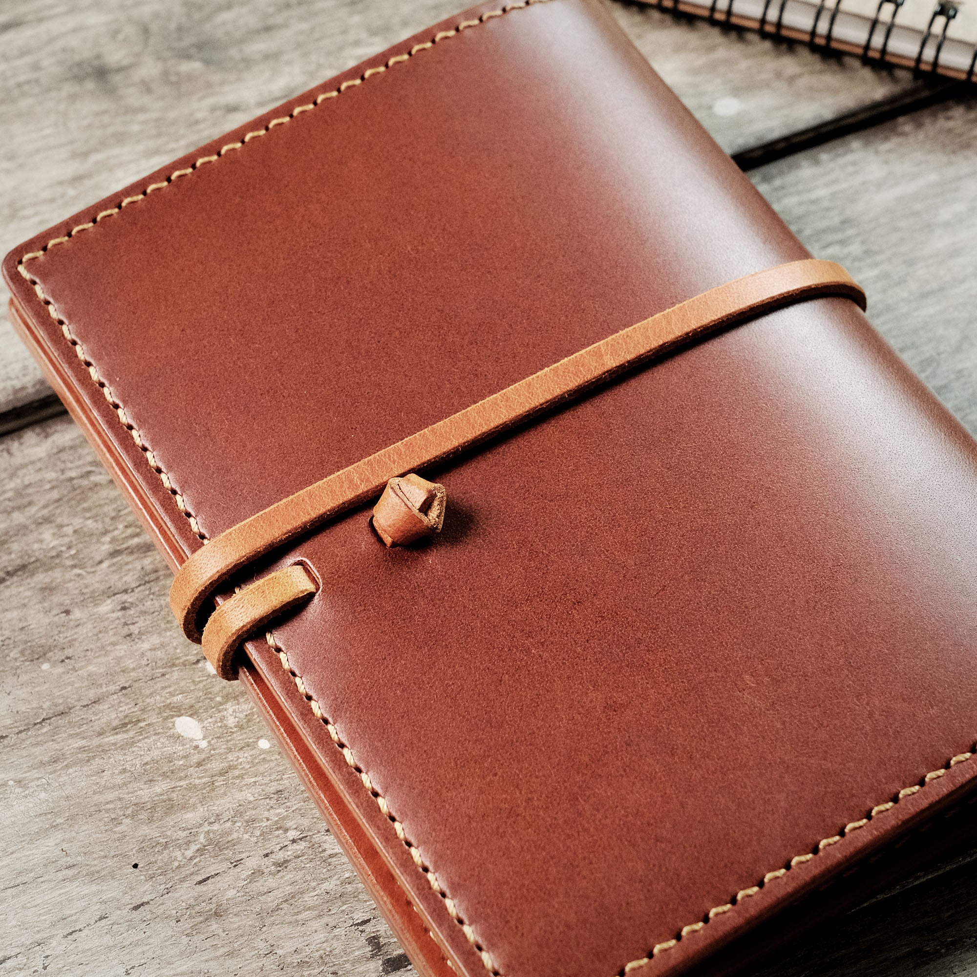 Back view of the closed passport wallet, showcasing its minimalist design and smooth finish.