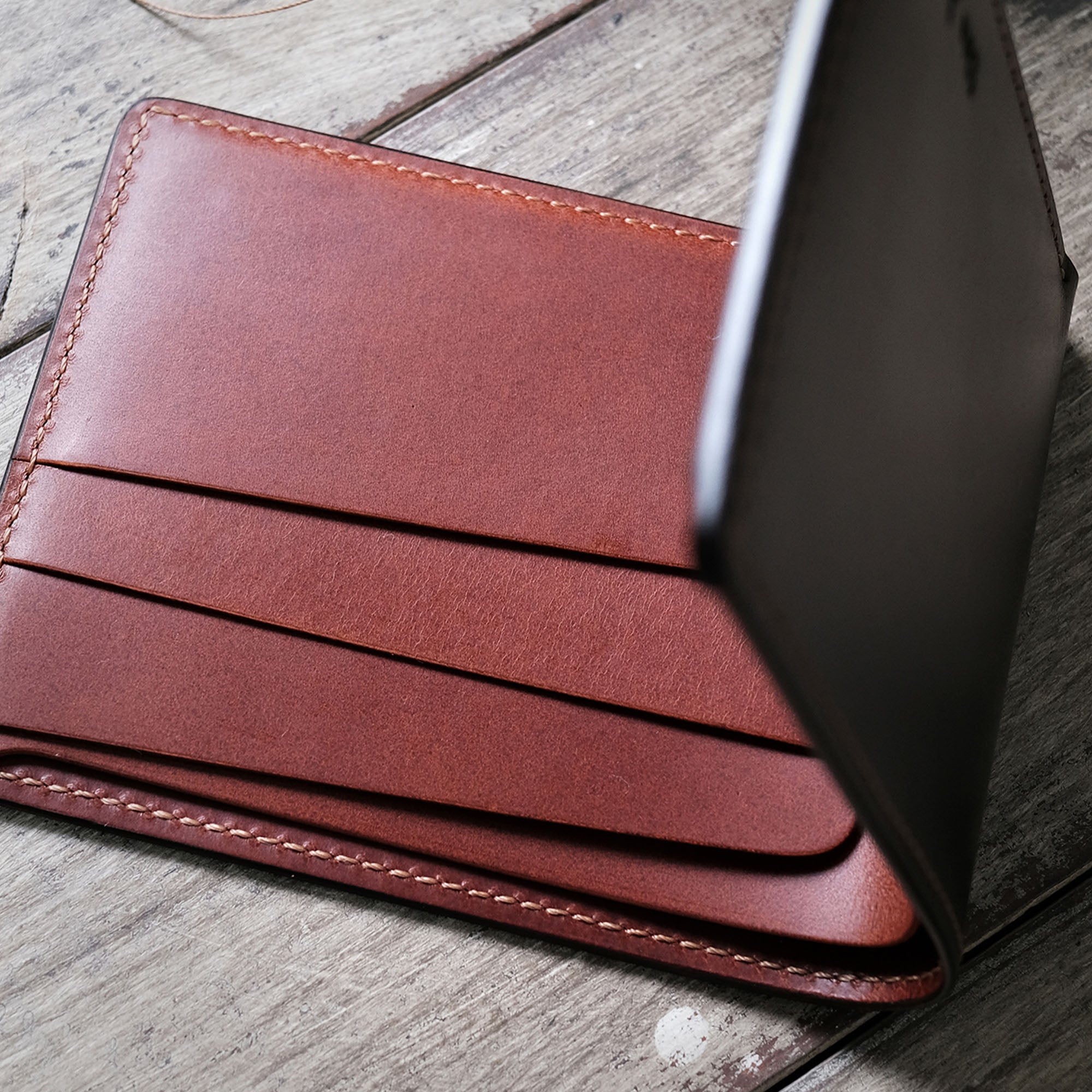 Interior layout of the Billfold Wallet, displaying the organized pocket structure.