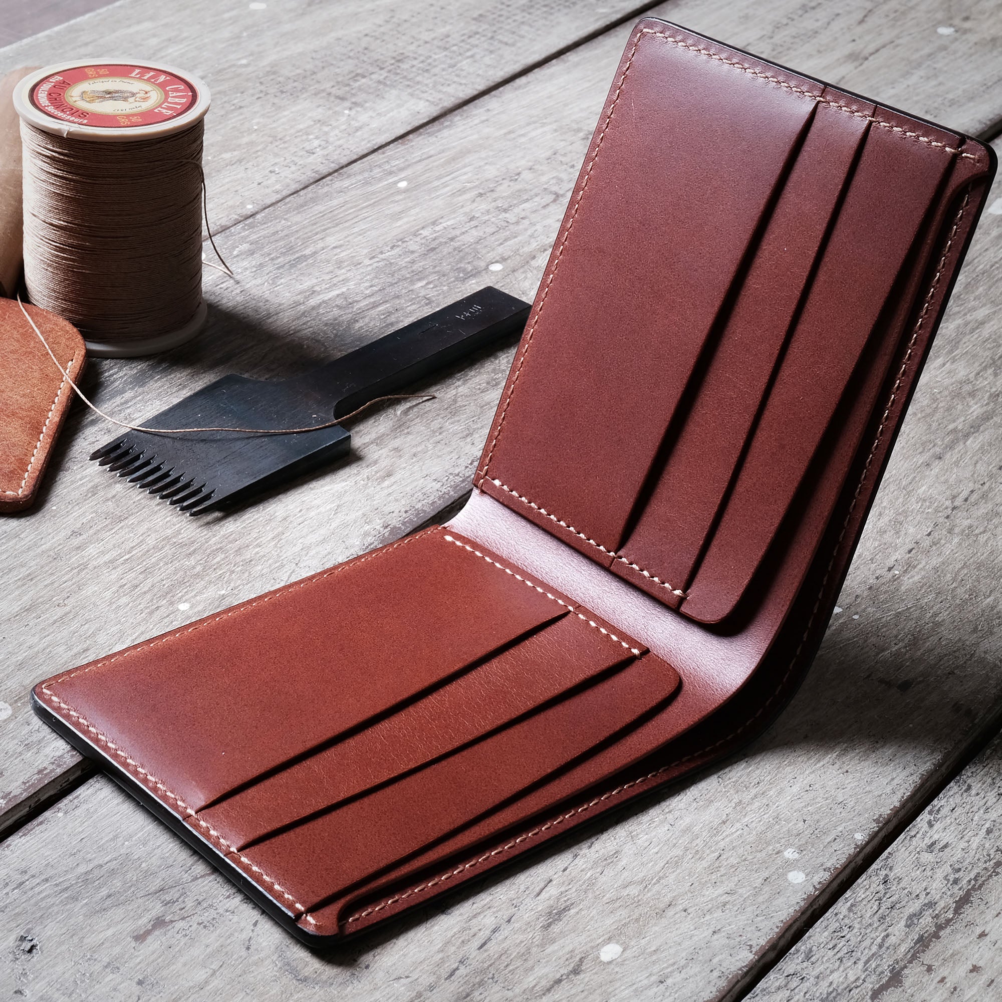 Full interior view of the Billfold Wallet, displaying all pockets, card slots, and compartments.