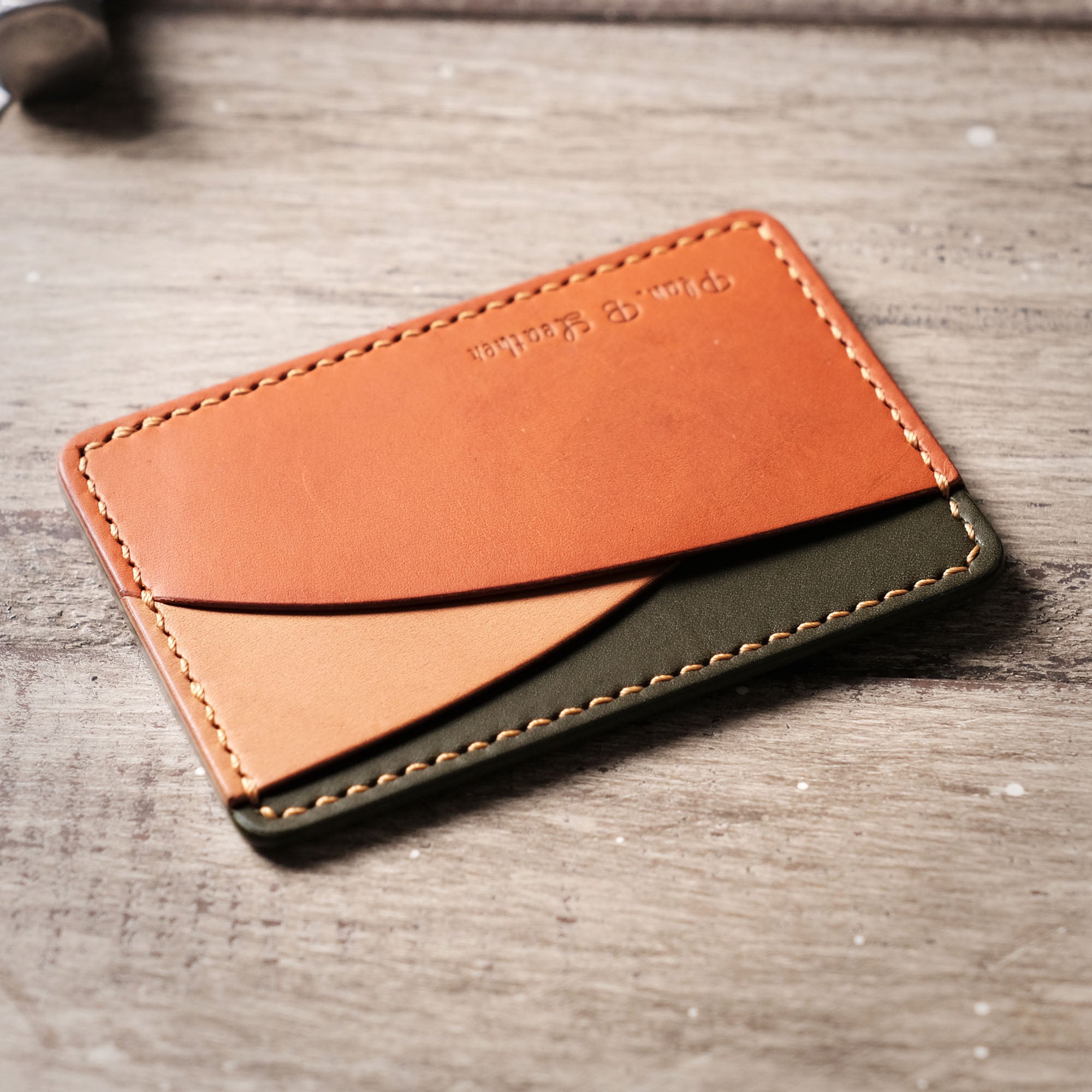 Angled shot of the Hills Card Holder, highlighting the smooth hill-shaped pocket lines.