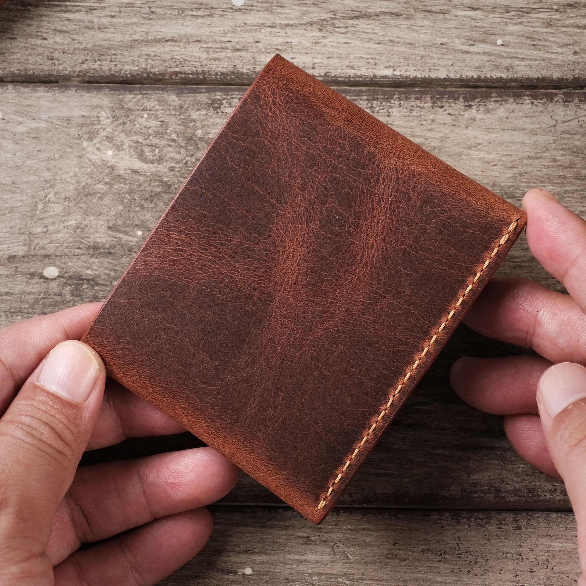 Back view of the Minimalist Wallet with Simple Structure resting on a hand.