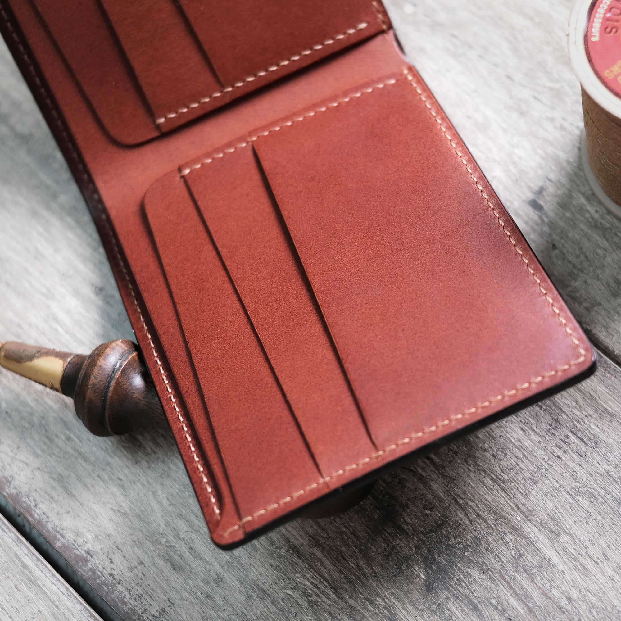 Close-up of the pockets inside the Billfold Wallet, showcasing the stitching and precise alignment.