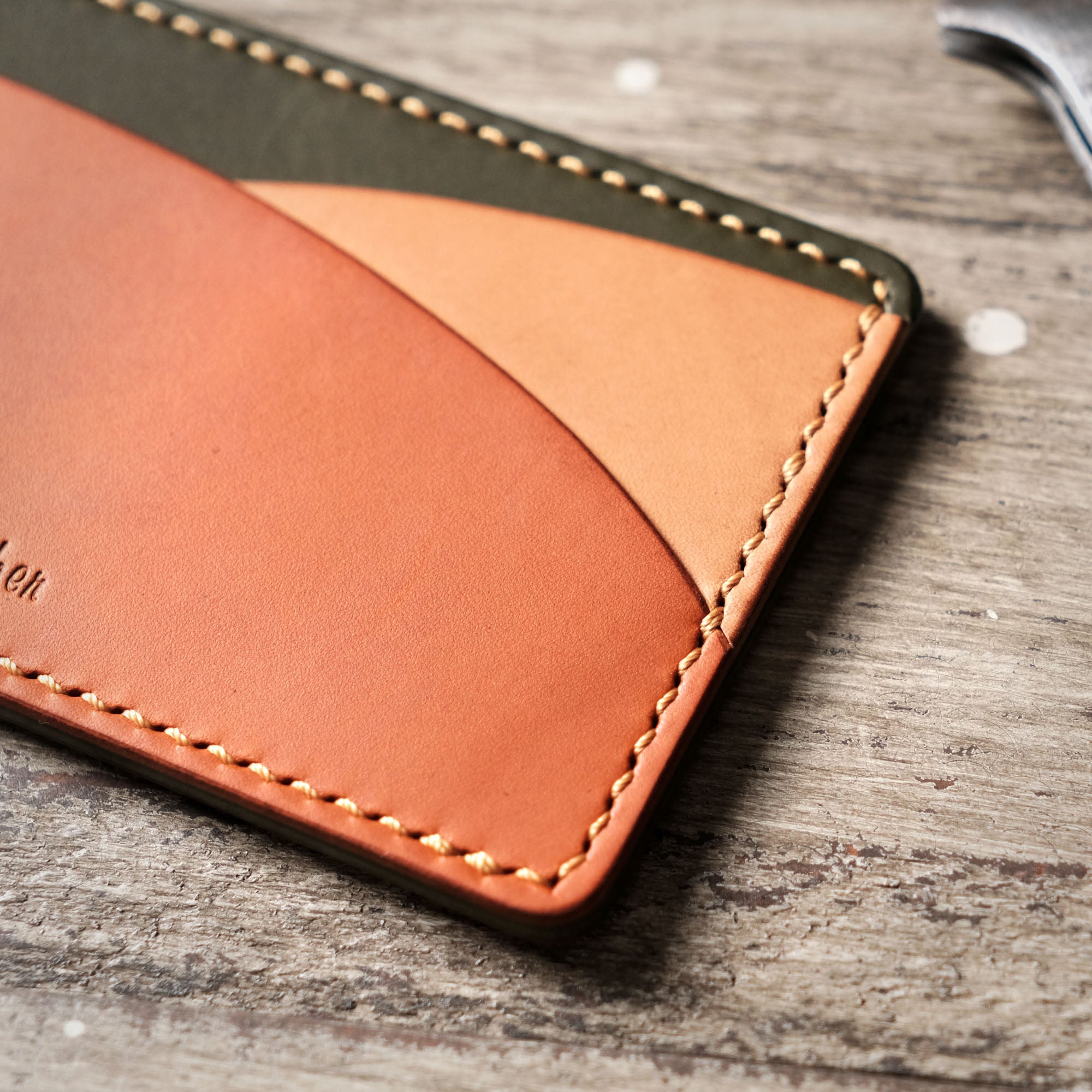 Zoomed-in shot of the Hills Card Holder, focusing on the even and tight stitching along the seams.