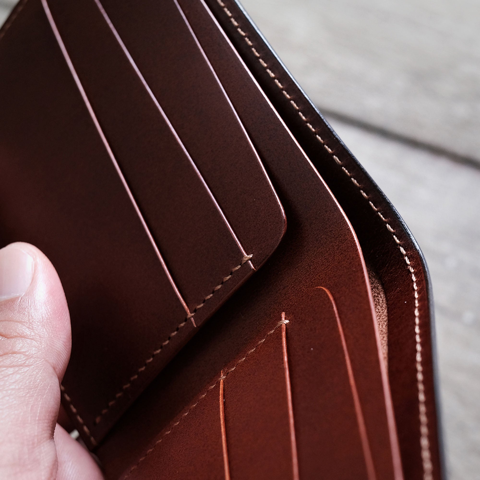 Open view of the Billfold Wallet, showcasing its organized internal layout and storage compartments.