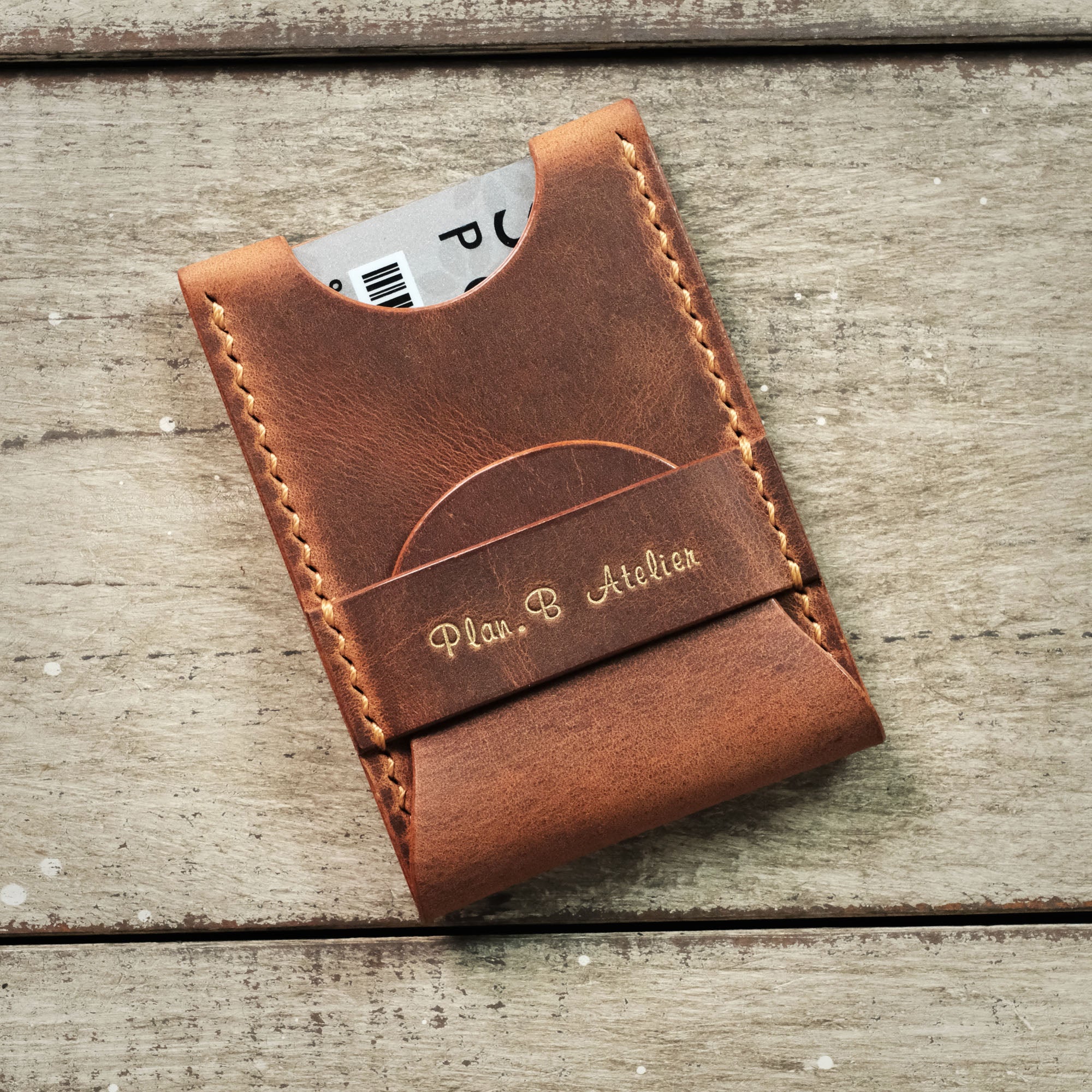 Top-down view of the closed card holder, emphasizing secure storage and minimalist design.