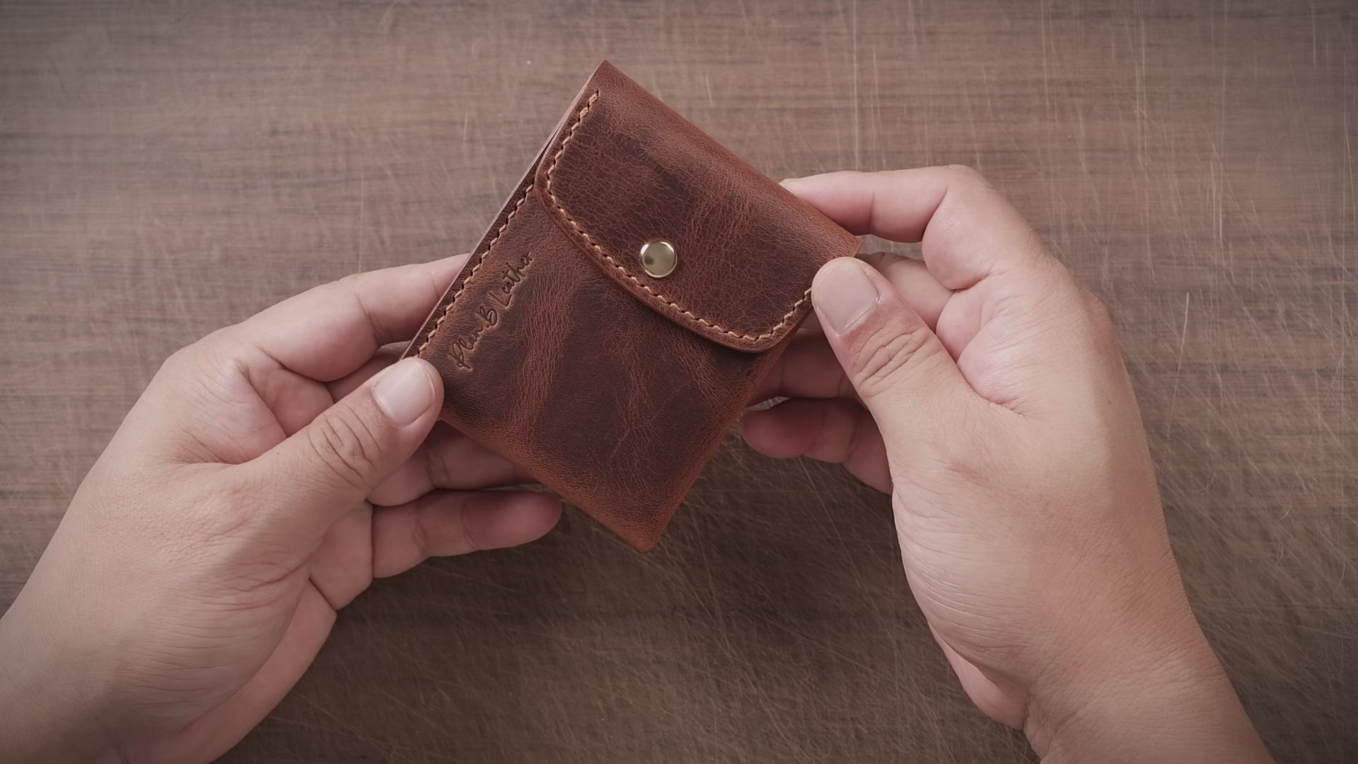 Video of the Minimalist Leather Wallet, showing how it holds cards and cash.